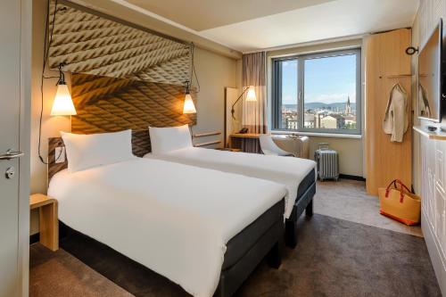 Habitación Doble Estándar - 2 camas del hotel Ibis Wien Hauptbahnhof. Foto 5