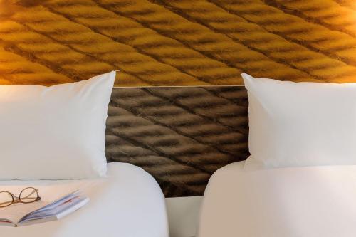 Habitación Doble Estándar - 2 camas del hotel Ibis Wien Hauptbahnhof. Foto 7