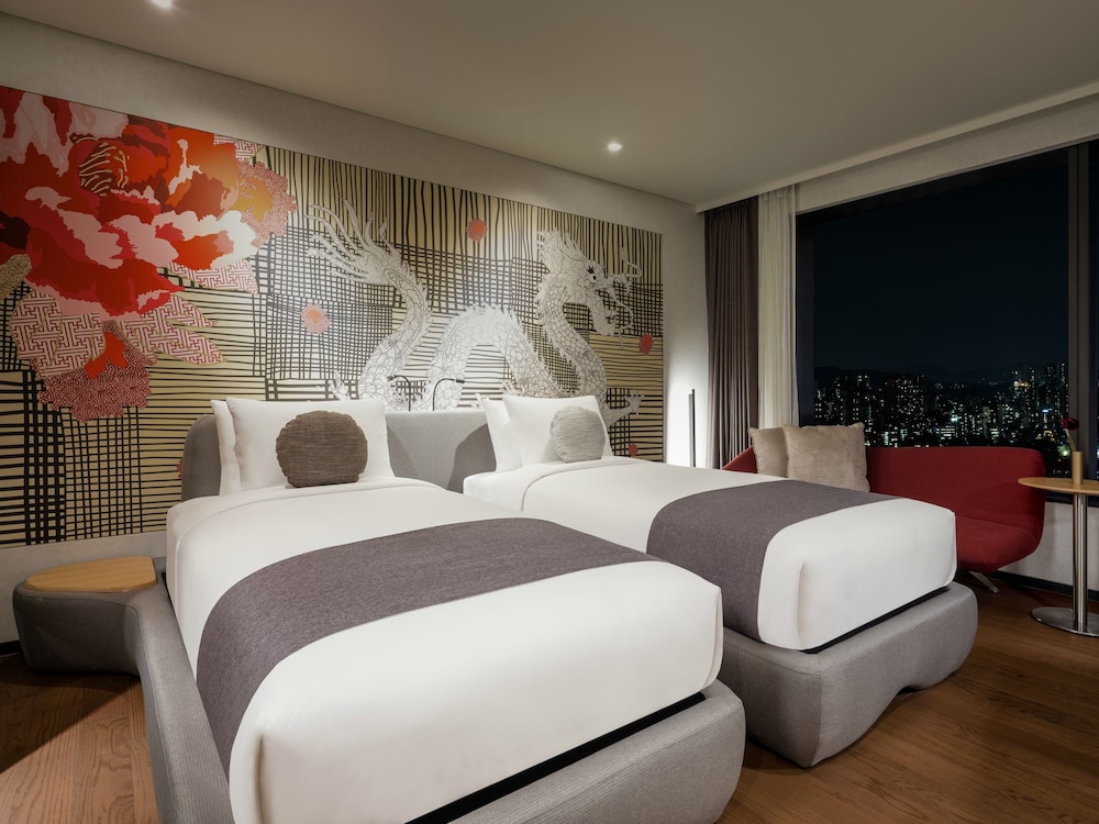 Habitación Superior con camas gemelas del hotel Novotel Ambassador Seoul Yongsan - Seoul Dragon City. Foto 1