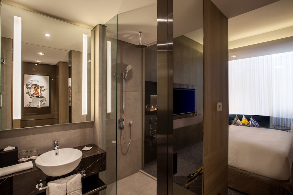 Habitación superior con 2 camas individuales del hotel Novotel Singapore On Stevens. Foto 3