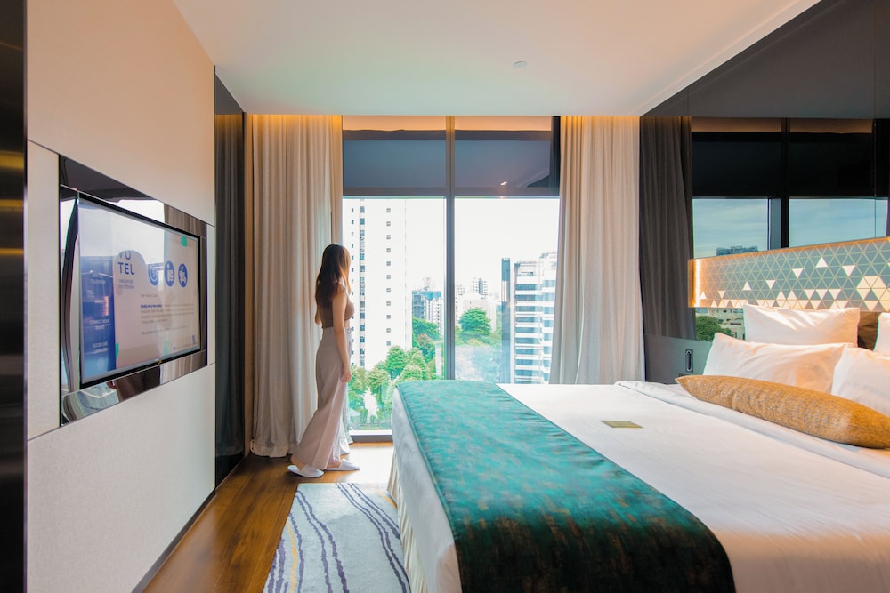 Habitación de Planta Premier con 1 cama doble del hotel Novotel Singapore On Stevens. Foto 1