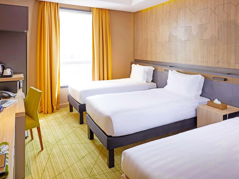Habitación Triple Estándar con 3 camas individuales del hotel Ibis Styles Makkah