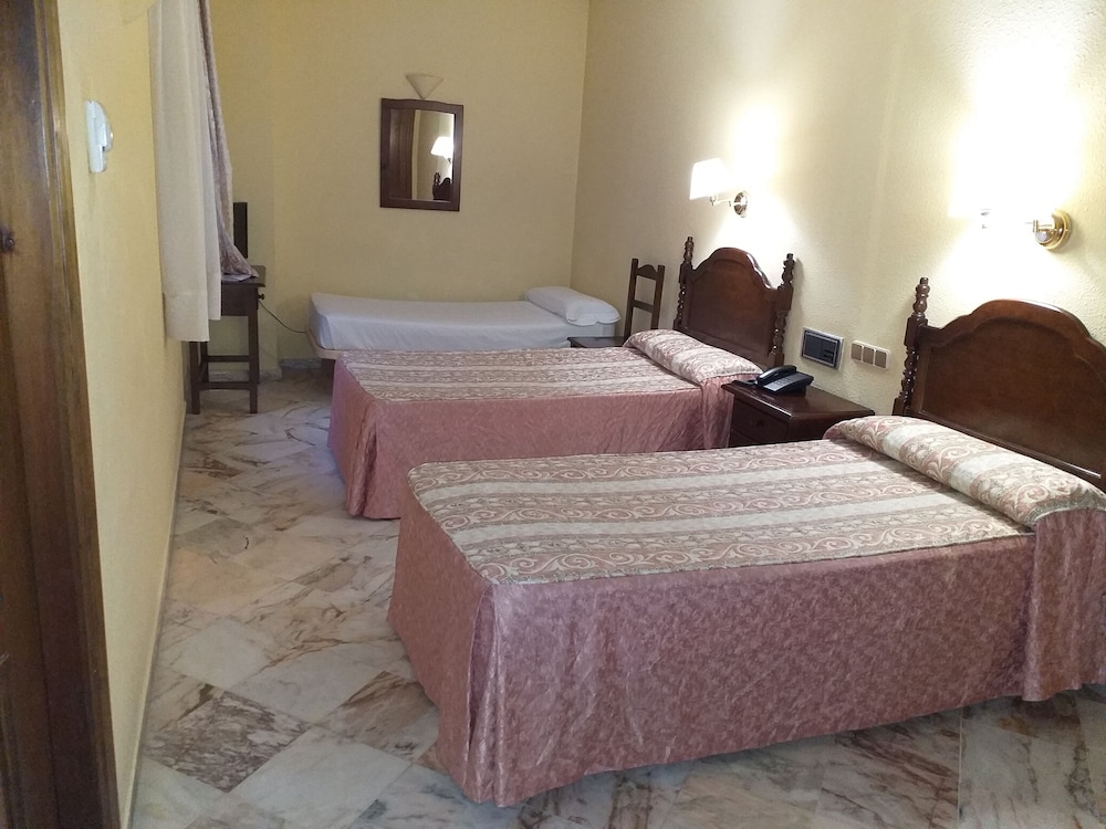 Habitación Triple del hotel Anfiteatro Romano