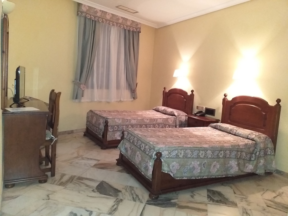 Habitación con 2 camas individuales del hotel Anfiteatro Romano