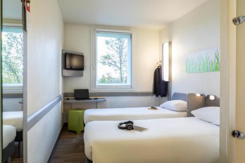 Habitación Doble - 2 camas del hotel ibis budget Roissy CDG Paris Nord 2. Foto 6