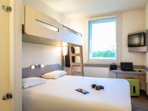 Habitación Triple del hotel ibis budget Roissy CDG Paris Nord 2. Foto 3