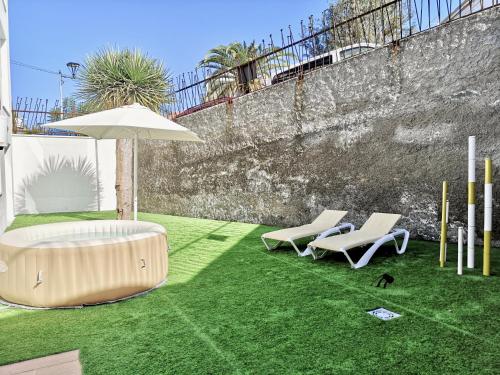 Trabaja y desconecta: Apartamento con bañera de hidromasaje y jardín del hotel The Blue Corner. Foto 12