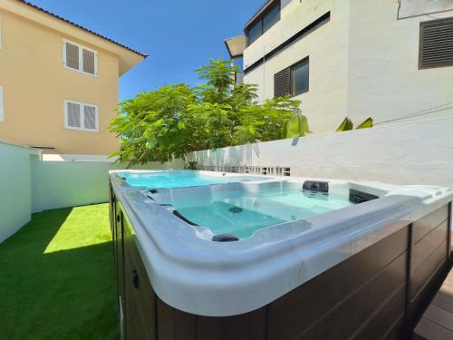 Trabaja y desconecta: Apartamento con bañera de hidromasaje y jardín del hotel The Blue Corner. Foto 3