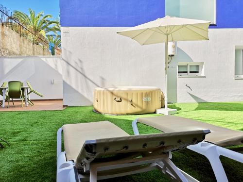 Trabaja y desconecta: Apartamento con bañera de hidromasaje y jardín del hotel The Blue Corner. Foto 7