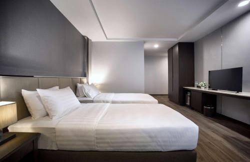 Habitación Doble Superior - 2 camas del hotel Surestay Plus By Best Western Sukhumvit 2. Foto 1