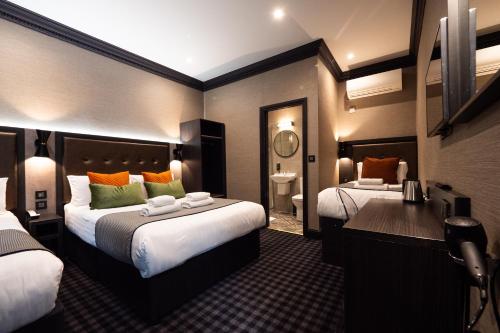 Habitación Cuádruple Deluxe del hotel The House Of Toby