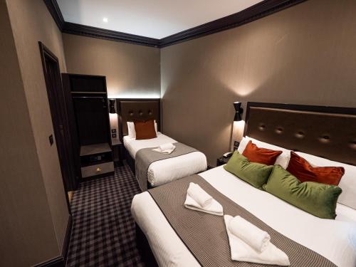 Habitación Cuádruple Deluxe del hotel The House Of Toby. Foto 1