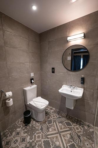 Habitación Cuádruple Deluxe del hotel The House Of Toby. Foto 2