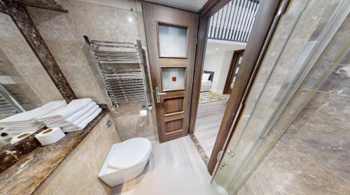 Deluxe Family Studio - Balcony del hotel London Plaza Serviced Apartments. Foto 12