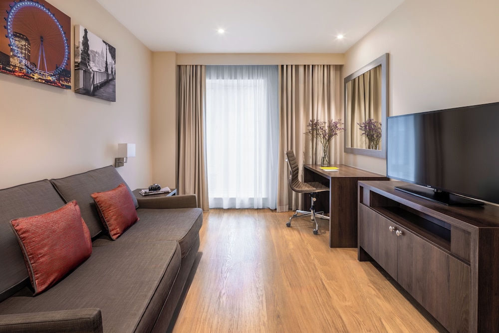 Suite Deluxe, 1 cama de matrimonio con sofá cama del hotel Marlin Waterloo. Foto 3