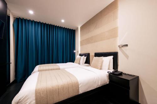 Estudio con 2 camas individuales del hotel NOX Golders Green. Foto 2