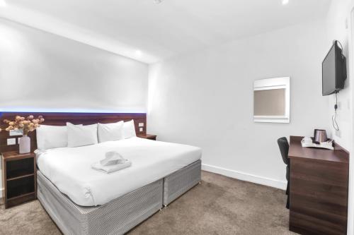 Habitación Doble con ducha del hotel Signature London. Foto 15