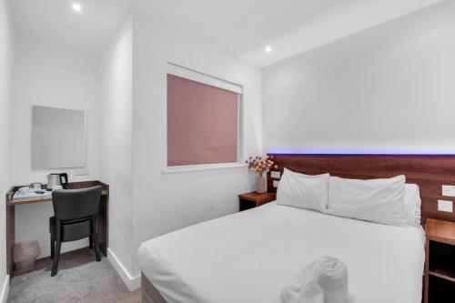 Habitación Doble con ducha del hotel Signature London. Foto 18
