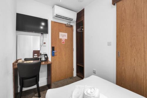 Habitación Individual Económica del hotel Signature London. Foto 9