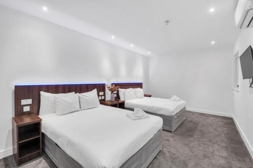Habitación cuádruple del hotel Signature London. Foto 8