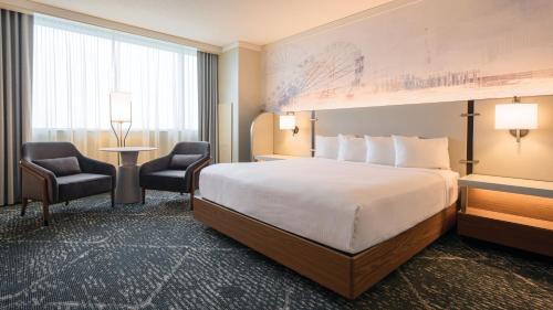Alojamiento Waterfront Tower con vistas a la ciudad - 1 cama extragrande - Planta superior - No fumadores del hotel Harrah’s Resort Atlantic City– A Caesars Rewards Destination. Foto 1