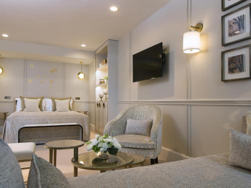 Suite Les Toits de Paris del hotel Le Narcisse Blanc and Spa. Foto 2