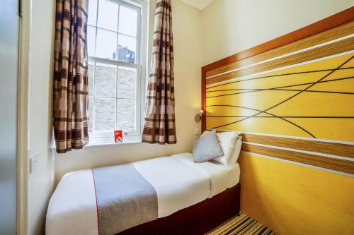 Habitación Doble Estándar - 2 camas del hotel Oyo Vegas. Foto 2