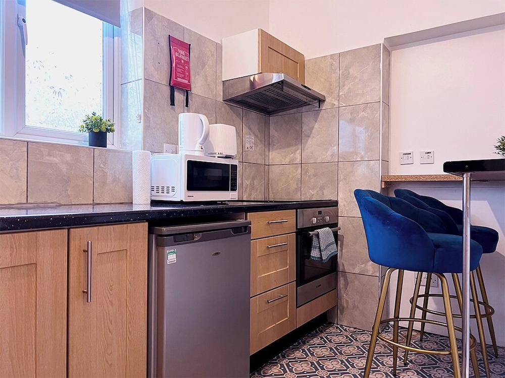Habitación triple del hotel United Lodge and Apartments. Foto 46