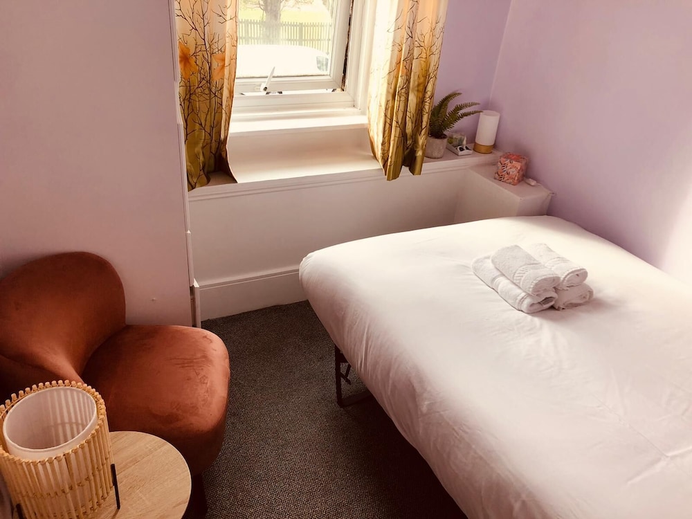 Cozy Double Room (Shared Bathroom) del hotel United Lodge and Apartments. Foto 1