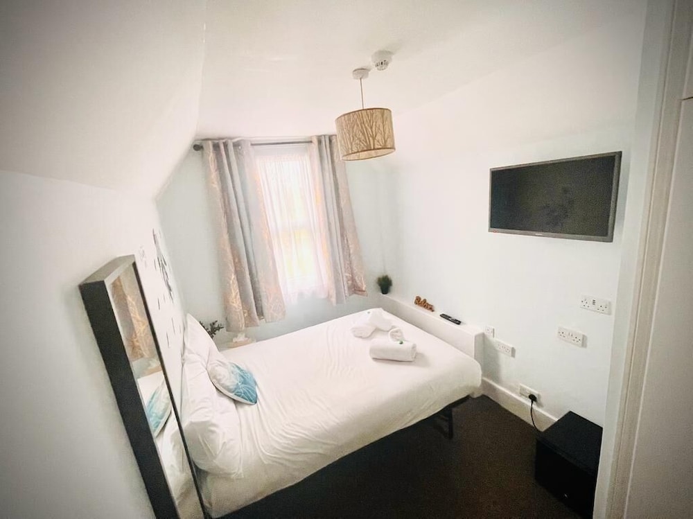 Cozy Double Room (Shared Bathroom) del hotel United Lodge and Apartments. Foto 5