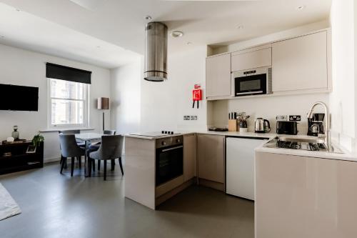 Apartamento Con Cocina 1 habitación Vista ciudad Sofá Cama incluido 1 Cama doble del hotel High Street Kensington Apartments. Foto 7