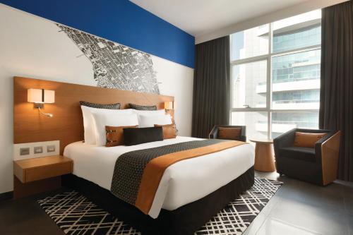 Habitación VYP - 1 cama extragrande del hotel Tryp By Wyndham Dubai. Foto 1