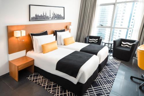 Habitación VYP - 2 camas individuales del hotel Tryp By Wyndham Dubai. Foto 3
