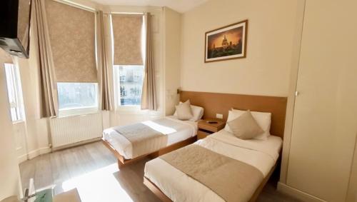 Habitación Doble - 2 camas del hotel NOX Olympia. Foto 7