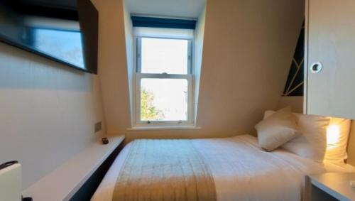 Habitación Individual del hotel NOX Olympia. Foto 1