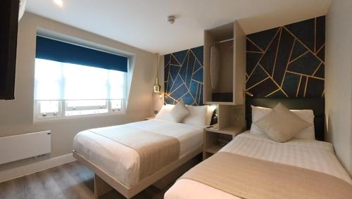 Habitación Triple del hotel NOX Olympia