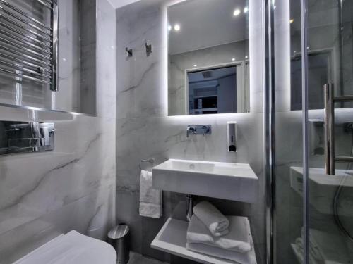 Habitación Triple del hotel NOX Olympia. Foto 7