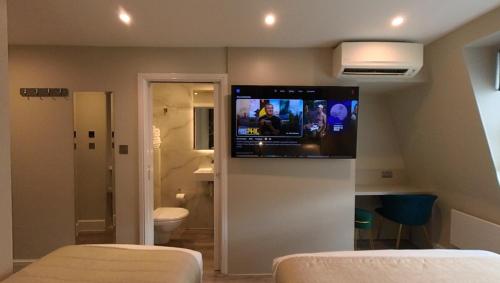 Habitación Triple del hotel NOX Olympia. Foto 13