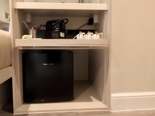 Habitación Triple del hotel NOX Olympia. Foto 16