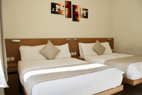 Family Room, 2 Double Beds del hotel NOX Olympia. Foto 6