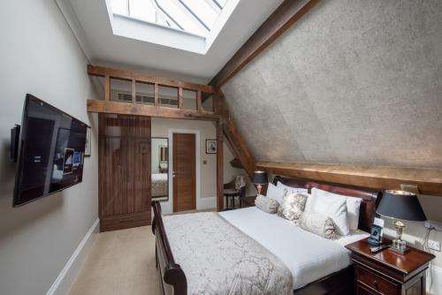 Loft con vistas al cielo del hotel The Lansbury Heritage A Sunday - Canary Wharf. Foto 1