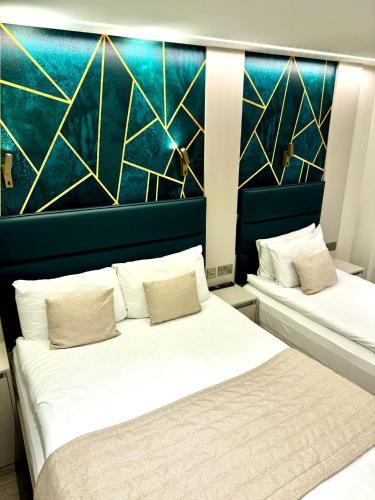 Habitación Triple del hotel NOX Richmond. Foto 1