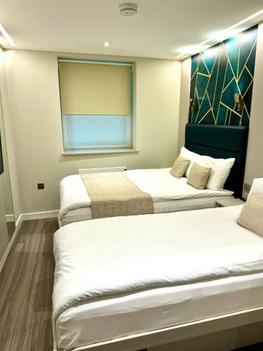 Habitación Triple del hotel NOX Richmond. Foto 25