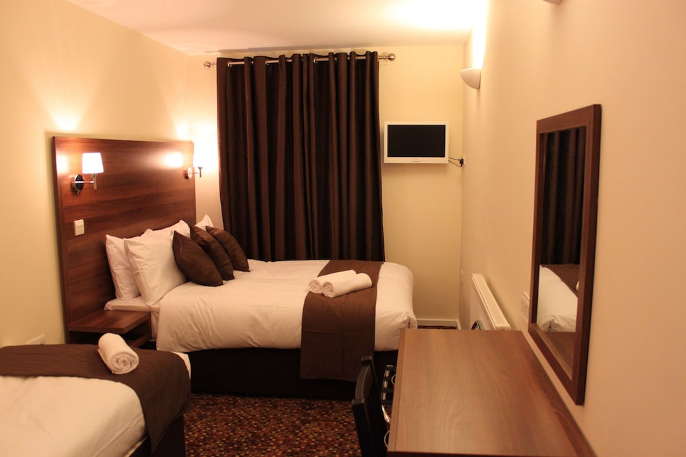 Habitación triple estándar del hotel Prince Regent Excel London. Foto 2