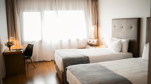 Habitación Doble - No fumadores - 2 camas del hotel Dazzler Asuncion. Foto 3
