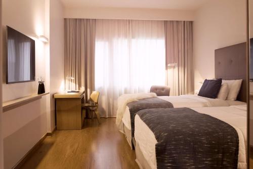 Habitación Doble Superior para no fumadores - 2 camas del hotel Dazzler Asuncion. Foto 3