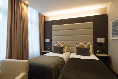Habitación Deluxe Doble o Twin del hotel The Kings Head. Foto 9