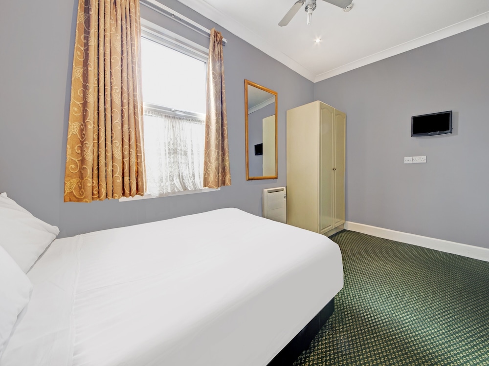 Habitación estándar doble, 1 cama doble del hotel Oyo Bostons Manor. Foto 3