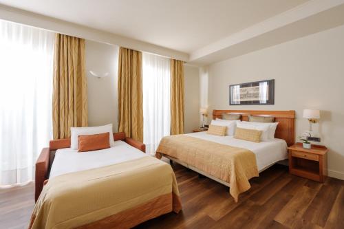 Habitación Triple Superior del hotel Dei Cavalieri Milano Duomo