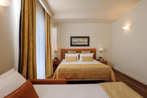 Habitación Triple Superior del hotel Dei Cavalieri Milano Duomo. Foto 3